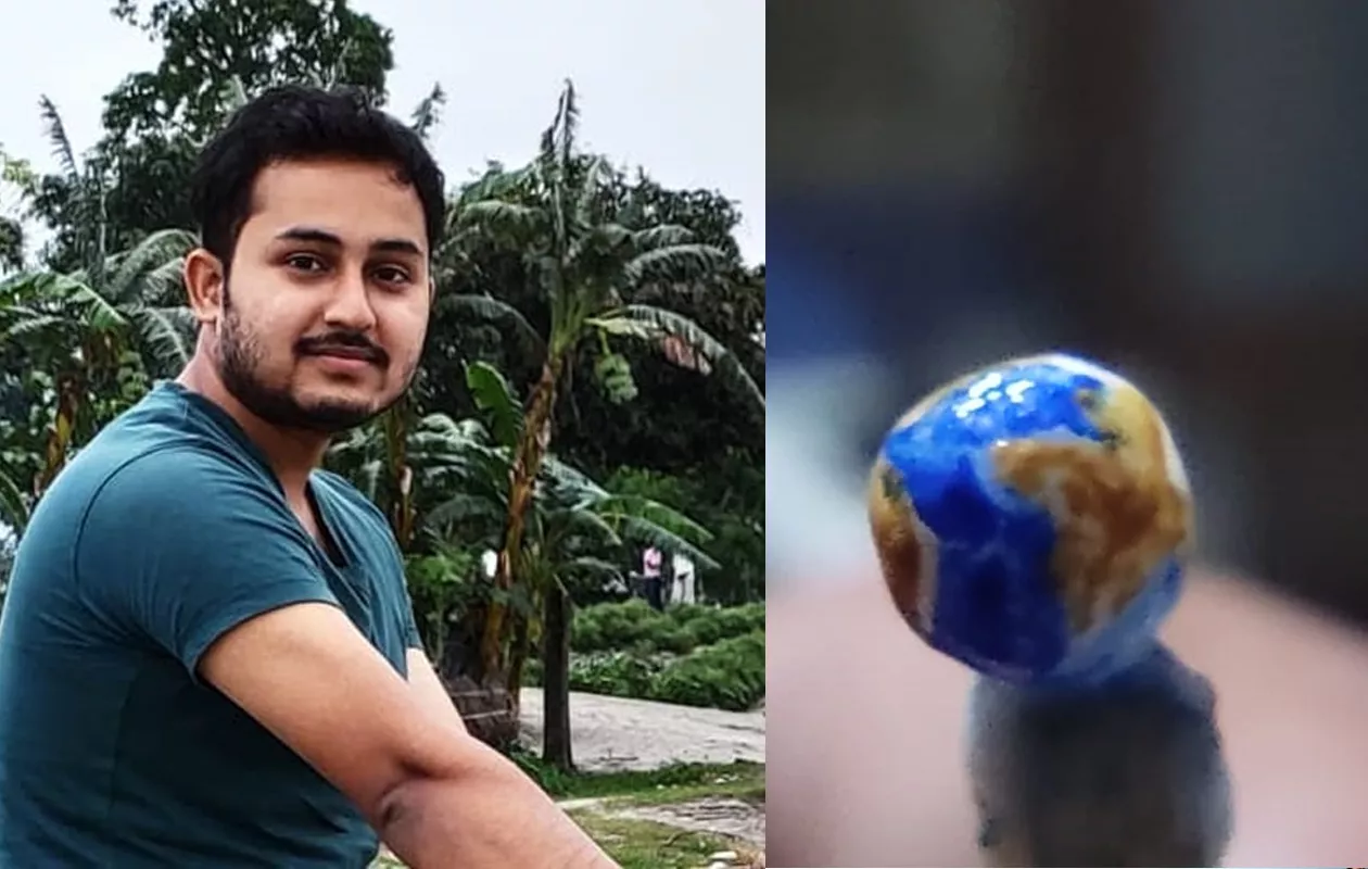 SMALLEST PAINTING OF WORLD GLOBE ON HOMEOPATHIC CAPSULE