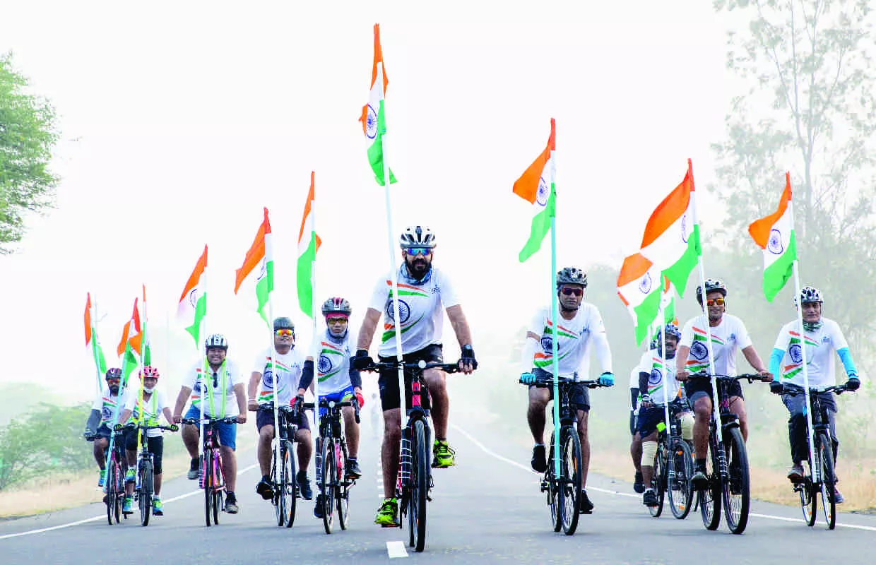 MAXIMUM PEOPLE CYCLING 100 KILOMETERS CARRYING INDIAN FLAG (MULTIPLE VENUES)