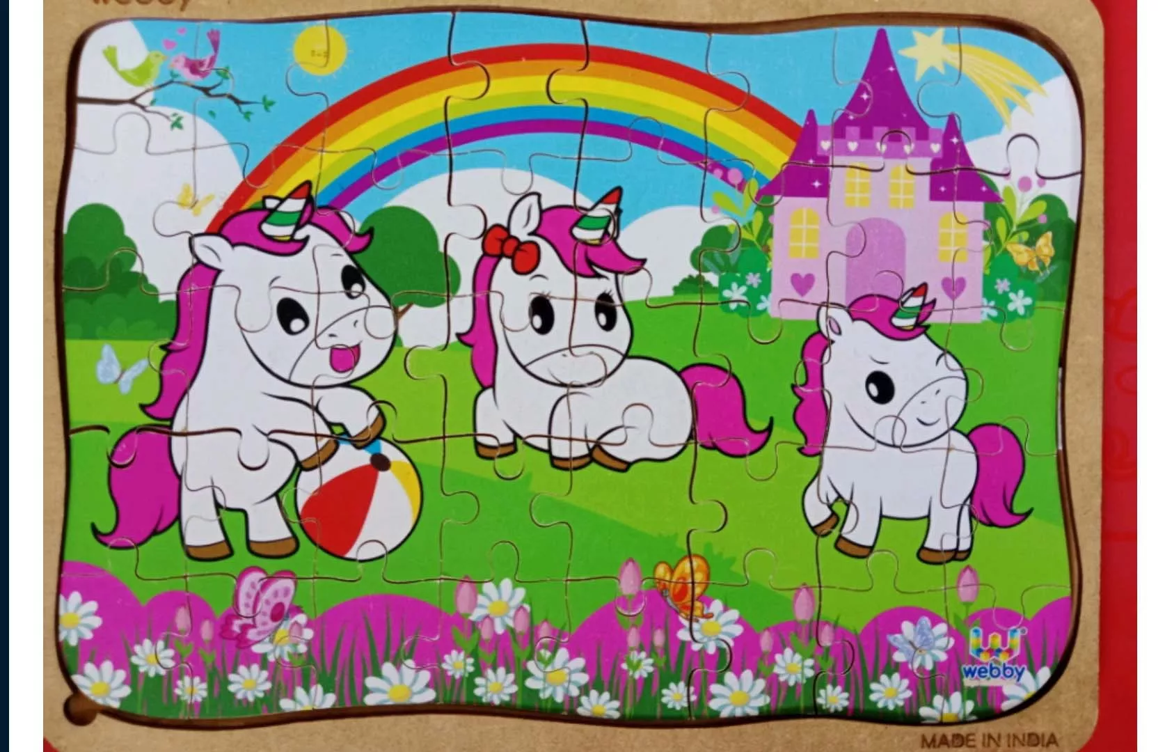 YOUNGEST TO SOLVE 40 PIECES JIGSAW PUZZLE IN A SHORT TIME"