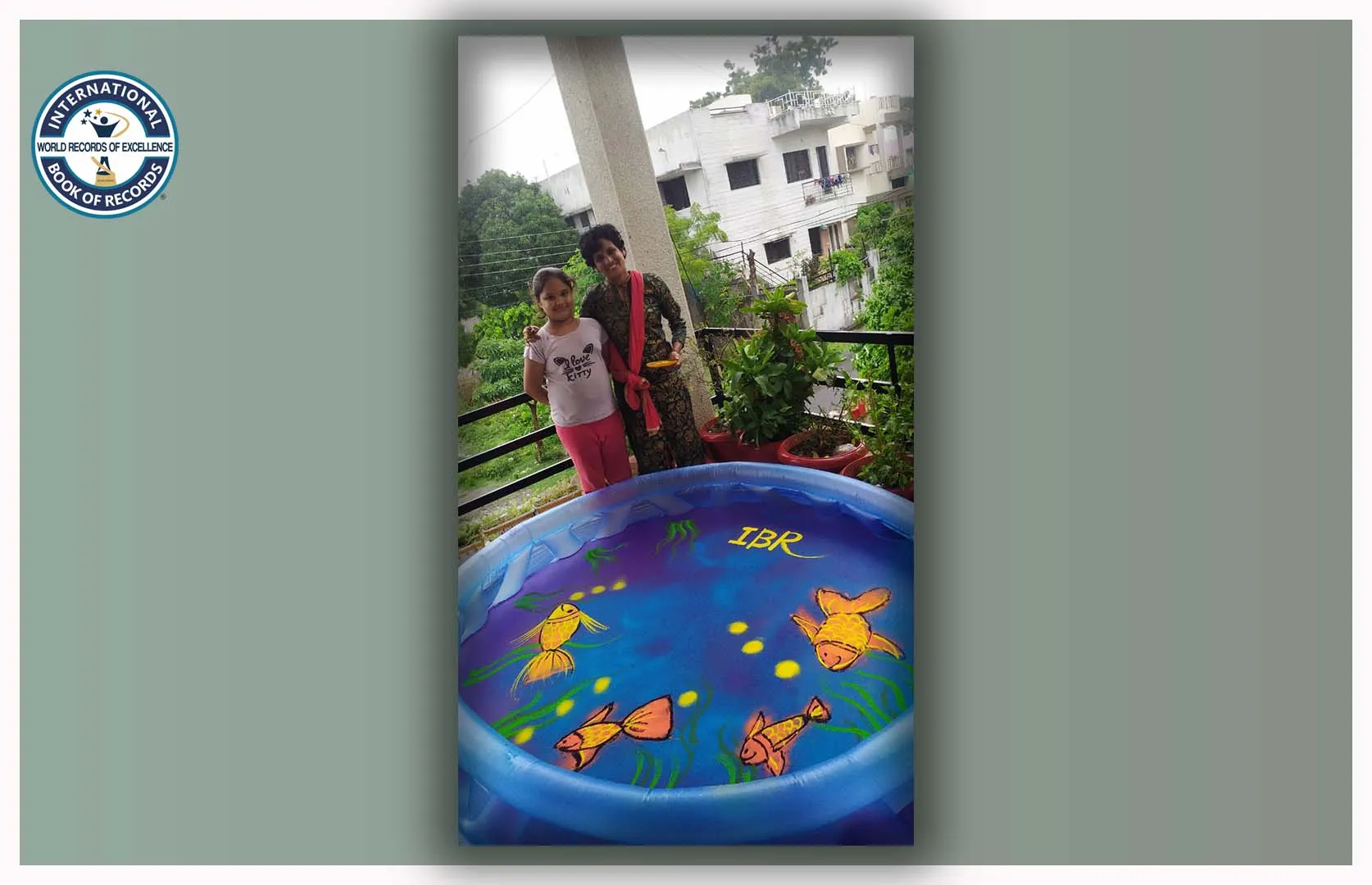 BIGGEST RANGOLI MADE ON THE SURFACE OF WATER POOL (KID)